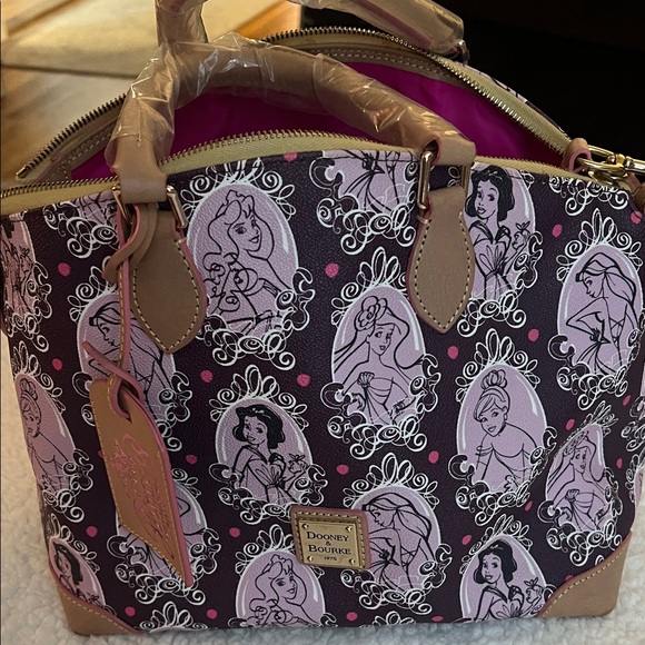 Dooney & Bourke Handbags - Disney and Bourke 2015 1/2 Princess Marathon Satchel 
New With Tags And Reg card